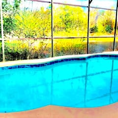 Ref 994PF. Modern lake view pool home. Very close to Disney