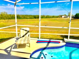 Ref 97. Villa with pool/spa conservation view. Near Disney