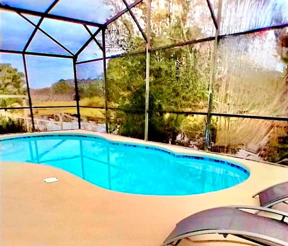 Ref 994PF. Modern lake view pool home. Very close to Disney