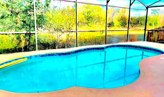 Ref 994PF. Modern lake view pool home. Very close to Disney